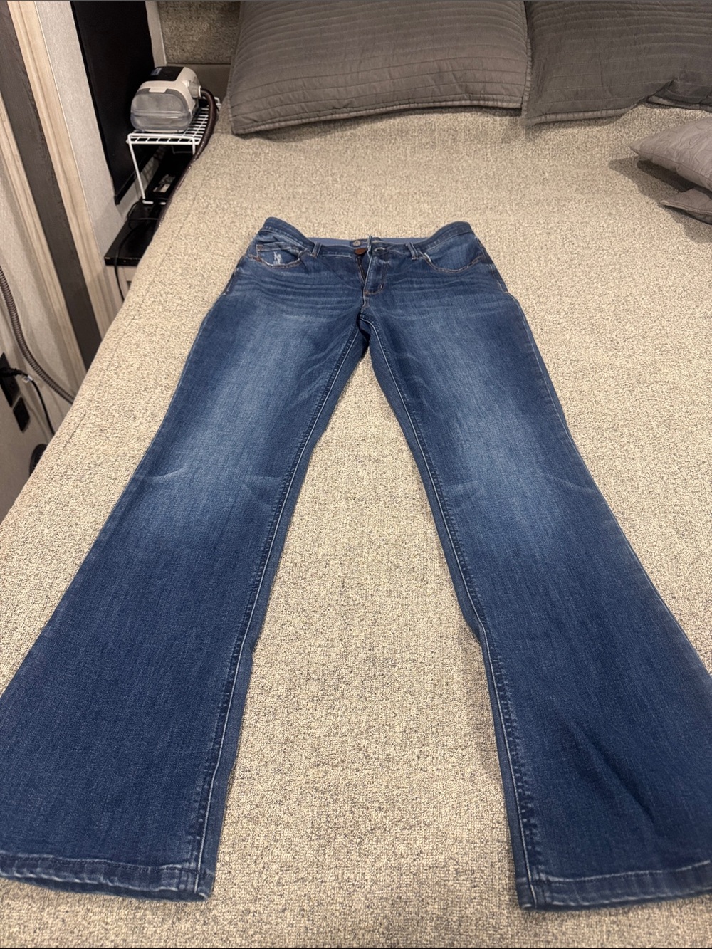 Democracy Indigo “Ab”solution boot cut jeans with cute detail on back pockets